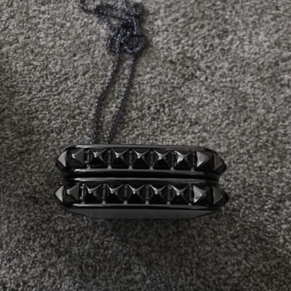Barney’s New York studded clutch